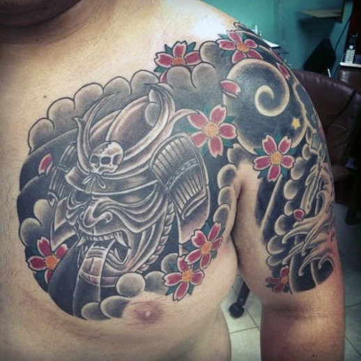 Mẫu hình xăm tattoo mặt quỷ trước ngực cho nam